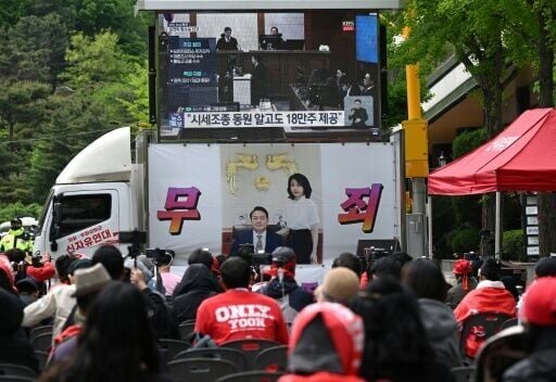 Supporters watch a live stream of the trial of South Korea's former first lady Kim Keon Hee, who has had her prison sentence for corruption increased on appeal