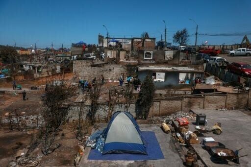 Massive fires in south-central Chile have killed at least 21 people and displaced thousands others