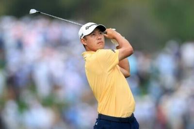 Collin Morikawa of the United States hits his second shot on the 10th hole during the first round of The Players Championship in Ponte Vedra Beach, Florida