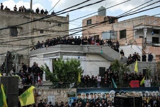 Gloom and sadness adorned faces in the crowd as mourners waited for the Hezbollah-organised ceremony to begin