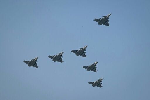 India's Republic Day parade ended with a squad of French-made Rafale jets zooming overhead