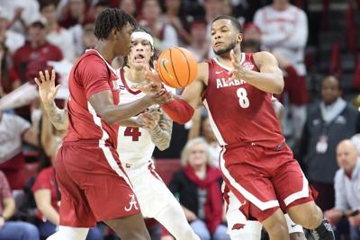 No. 3 Alabama holds off Arkansas, joins Auburn atop SEC