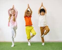 Kids exercising stock