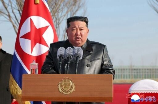 This picture taken on February 1, 2026 and released by North Korea's KCNA shows North Korean leader Kim Jong Un delivering a speech in North Pyongan Province
