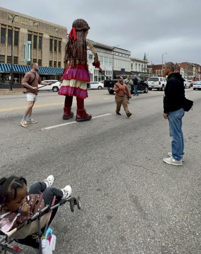 Little Amal puppet wows Selma as crowd gathers to follow her through downtown, photo gallery