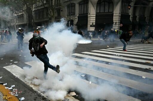 Argentine football fans clash with police at pensions march