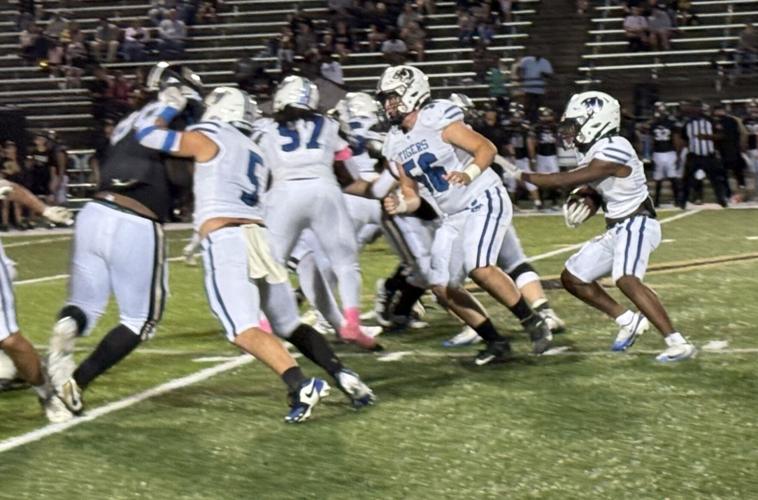 Demopolis running football