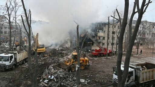 A ballistic missile strike destroyed a five-storey apartment block in Kharkiv, killing nine