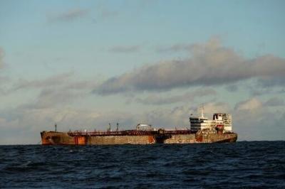 UK salvage teams board North Sea crash vessels