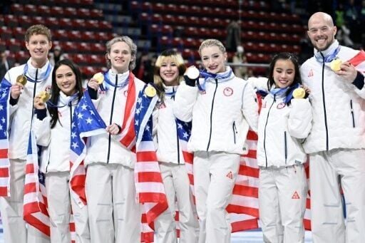 Ilia Malinin (third from left) sealed Olympic figure skating team gold for the United States -- now he wants the individual title