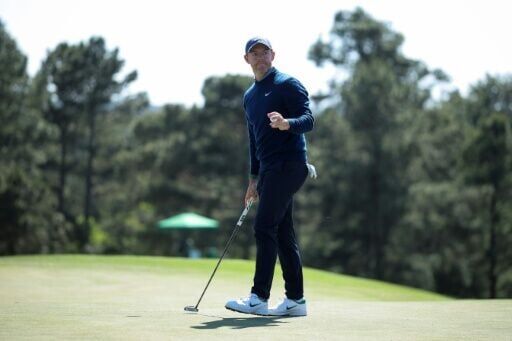 Defending champion Rory McIlroy fired a five-under par 67 to share the lead in the opening round of the 90th Masters