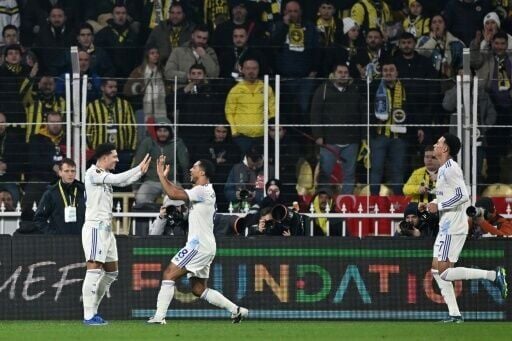 Jadon Sancho (L) celebrates his goal that sealed Aston Villa's spot in the Europa League last 16
