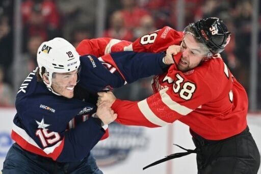 Matthew Tkachuk of Team USA fights Canada's Brandon Hagel at the 4 Nations Face-Off last year