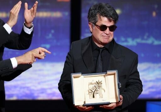 Filmmaker Panahi cheered on return to Iran after Cannes triumph
