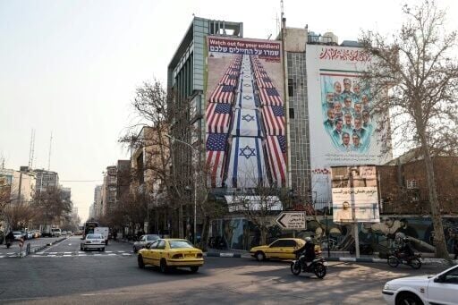 An anti-US and anti-Israel banner is displayed in Iran, which has warned against American military intervention over a deadly crackdown on protests