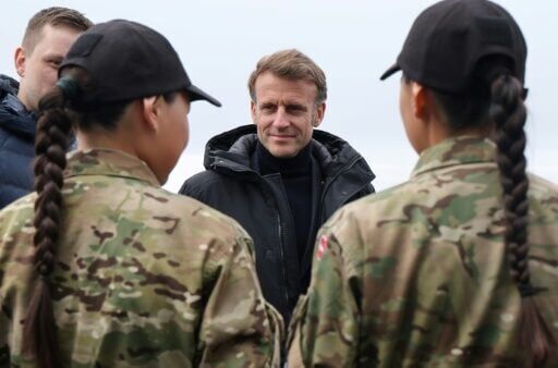 Macron, on Greenland visit, berates Trump for threats against the territory