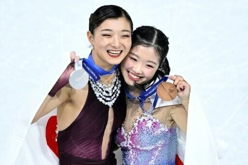 Japan's Kaori Sakamoto (L) and Ami Nakai (R) are targetting gold at the world figure skating championships after both medalled at the Milan-Cortina Winter Olympics