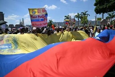 Opponents to the government of Venezuelan interim President Delcy Rodriguez demonstrate demanding salary and pension raises in Caracas on April 9, 2026