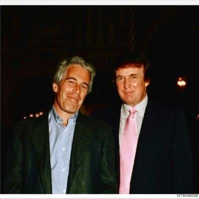 This undated photo released by the US Justice Department on January 30, 2026 as part of the Jeffrey Epstein files shows Epstein with Donald Trump in an unidentified location