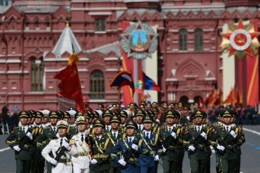 Putin hails troops in Ukraine as allies attend WWII parade