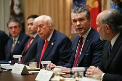 US Secretary of Defense Pete Hegseth speaks alongside President Donald Trump during a cabinet meeting on December 2, 2025