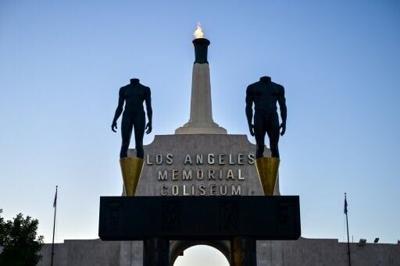 The LA28 Olympic cauldron is lit after a ceremonial lighting at the Memorial Coliseum ahead of the opening of registration for tickets to the Games