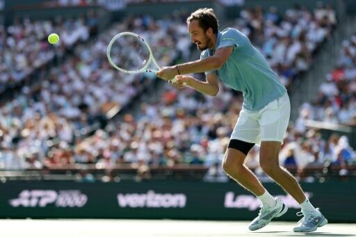 Russian Daniil Medvedev returns eyes up a shot in loss to Jannik Sinner in the Indian Wells ATP Masters final