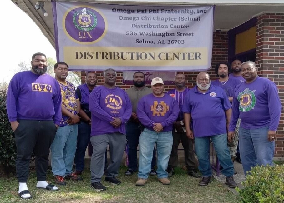 Omega Psi Phi gives disaster assistance at distribution center