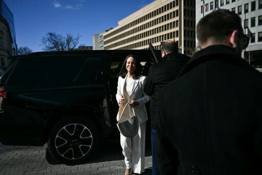 Venezuelan opposition leader Maria Corina Machado exits a vehicle as she arrives near the White House