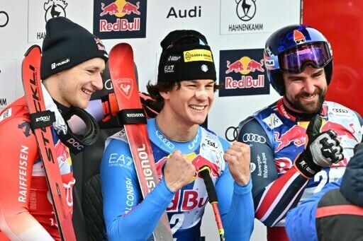 (L-R) Switzerland's Marco Odermatt, Italy's Giovanni Franzoni and France's Maxence Muzaton
