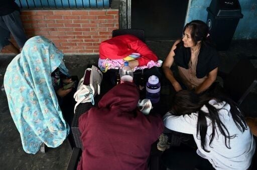 Relatives of prisoners waited anxiously for news of their loved ones outside El Rodeo 1 prison, east of Caracas