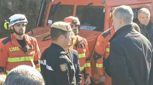 Spain's King Felipe VI and Queen Letizia visit rescue workers at the site of the accident