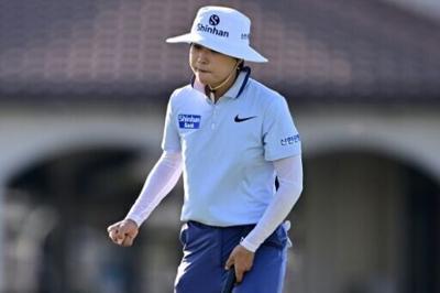 South Korea's Lee So-mi reacts after making an eagle putt on the 17th hole to help grab the lead after the opening round of the LPGA Tour Championship