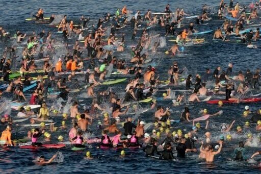 Surfers and swimmers joined in a tribute to the victims of Sunday's Bondi Beach attack