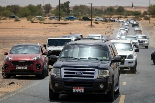 Monsoon-loving Indian expats chase rain in UAE desert
