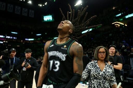 Ayo Dosunmu of the Minnesota Timberwolves celebrates after scoring 43 points in the team's NBA playoff victory over the Denver Nuggets