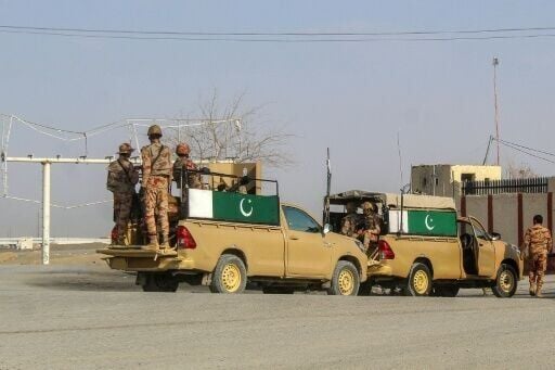 Pakistani soldiers patrol near the Pakistan–Afghanistan border crossing in Chaman