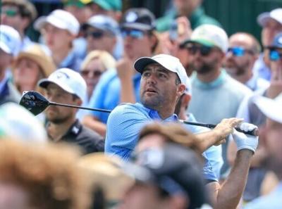 Top-ranked Scottie Scheffler plays a tee shot during a practice round ahead of the 90th Masters