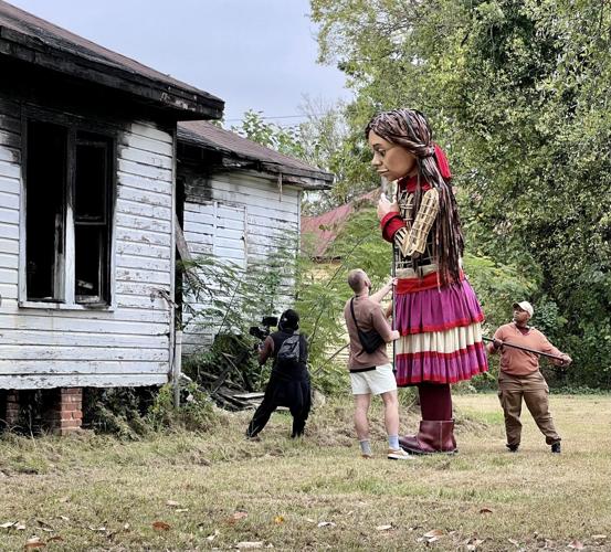 Little Amal puppet wows Selma as crowd gathers to follow her through downtown, photo gallery
