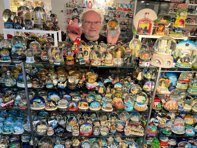 Man sets world record for largest snow globe collection