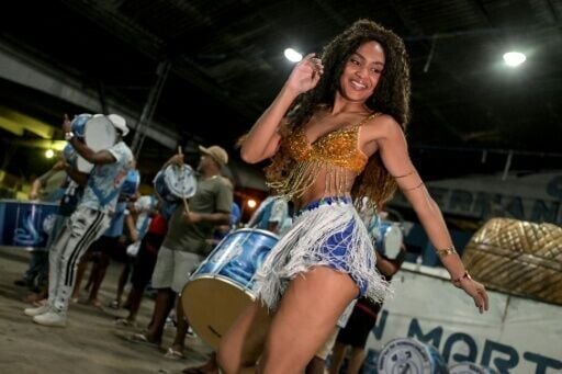 Samba dancers and drummers fine-tune their rhythms for a grassroots carnival parade few tourists have heard of