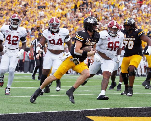 Missouri quarterback Beau Pribula (9) runs the ball for a touchdown (copy)