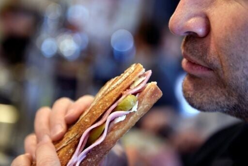 The upward climb of the worker's sandwich shows no signs of slowing