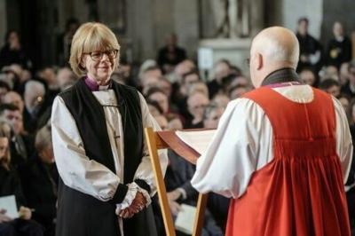 Sarah Mullally (L) takes part in the 'Confirmation of Election' ceremony to legally confirm her position as the new Archbishop of Canterbury, at St Paul’s Cathedral in London on January 28, 2026.