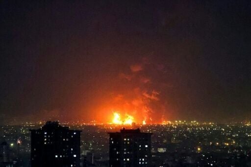 Fire lights up the sky in Tehran as Iranian oil refineries are hit during the US-Israeli campaign