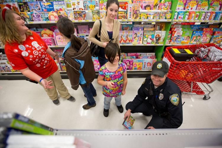 Shop-With-A-Cop gifts hundreds of kids via local agencies, Columbia Basin