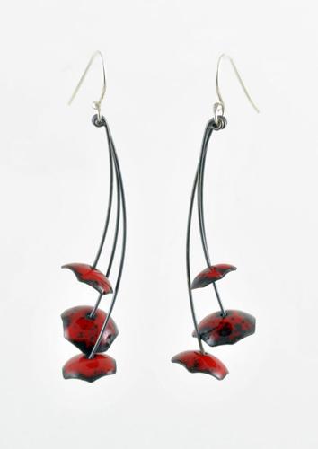 Three pod earrings in red