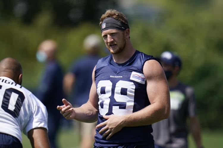 Dissly, Olsen fuel Seahawks offense at tight end, National