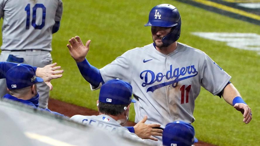 Los Angeles Dodgers' Justin Turner (21) stands at first base