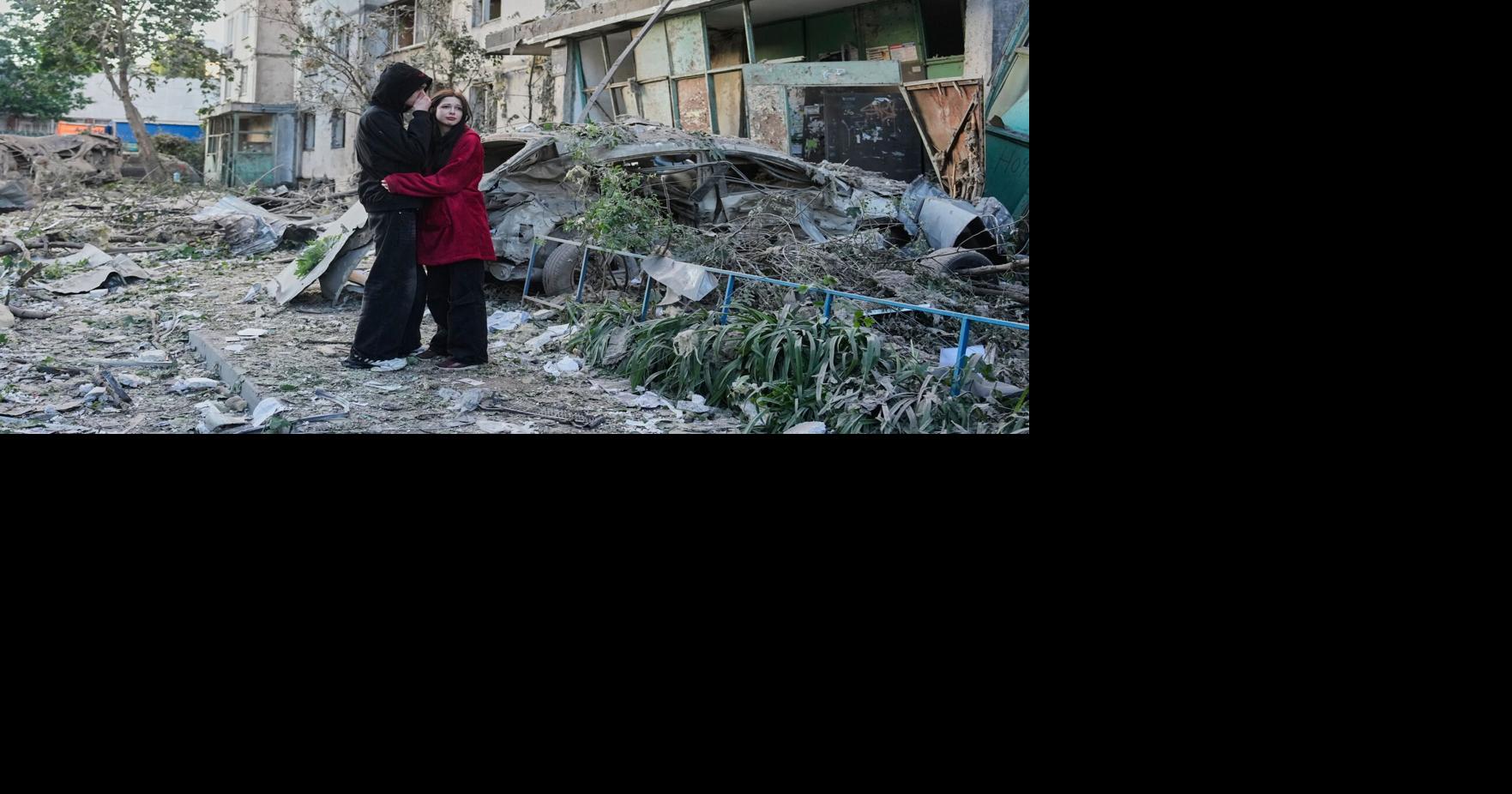 Russian attack on Ukraine capital kills at least 3 and traps others in ...